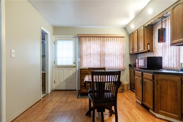 182 E Pulteney St, Corning City, NY 14830 - dining space featuring light wood-type flooring and baseboards