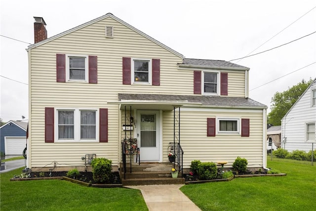 182 E Pulteney St, Corning City, NY 14830 - view of front facade with a front yard and a chimney