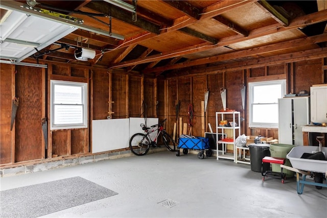 182 E Pulteney St, Corning City, NY 14830 - garage featuring a garage door opener