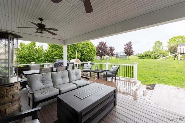 17 Knoche Way, Orchard Park, NY 14127 - wooden deck featuring outdoor lounge area, a ceiling fan, a lawn, and a playground