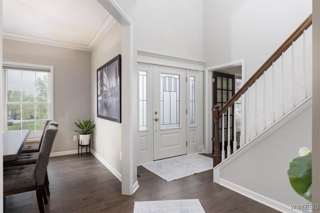 17 Knoche Way, Orchard Park, NY 14127 - entrance foyer featuring dark wood finished floors, baseboards, stairway, and ornamental molding