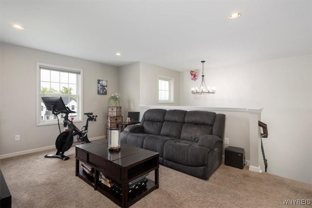 17 Knoche Way, Orchard Park, NY 14127 - living area with carpet flooring, a chandelier, recessed lighting, and baseboards
