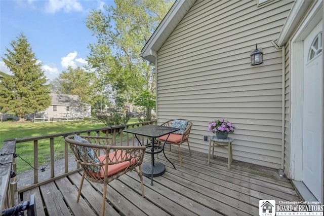 88 Summit Ave, Orchard Park, NY 14127 - wooden deck featuring a yard and outdoor dining space