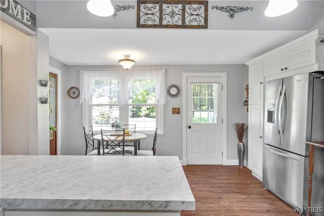 7263 Quaker Rd, Orchard Park, NY 14127 - kitchen featuring stainless steel fridge, dark wood-type flooring, white cabinets, light countertops, and baseboards