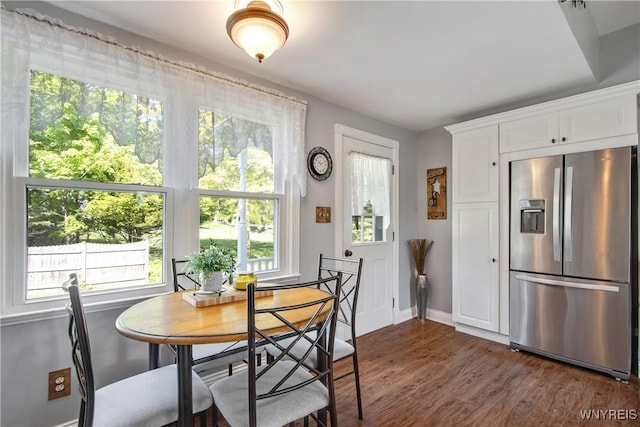 7263 Quaker Rd, Orchard Park, NY 14127 - dining room featuring dark wood-style floors and baseboards