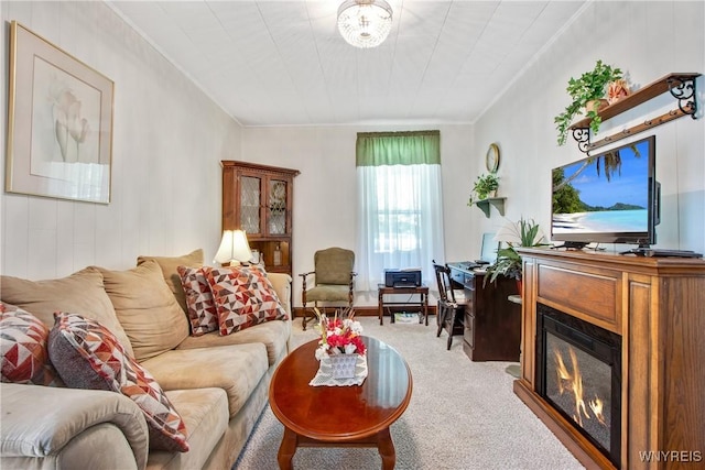 7263 Quaker Rd, Orchard Park, NY 14127 - living room with carpet, crown molding, and a glass covered fireplace