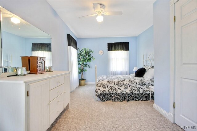7263 Quaker Rd, Orchard Park, NY 14127 - bedroom with light colored carpet and baseboards