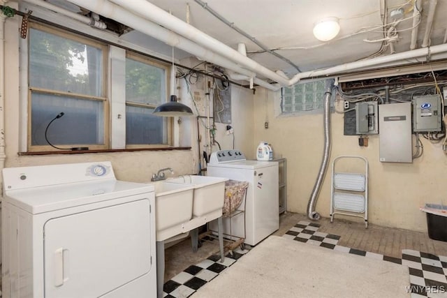 2884 Main St, Buffalo, NY 14214 - laundry area with tile patterned floors, separate washer and dryer, and electric panel