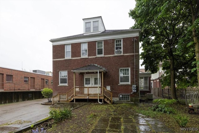 2884 Main St, Buffalo, NY 14214 - view of front of property featuring brick siding and central air condition unit