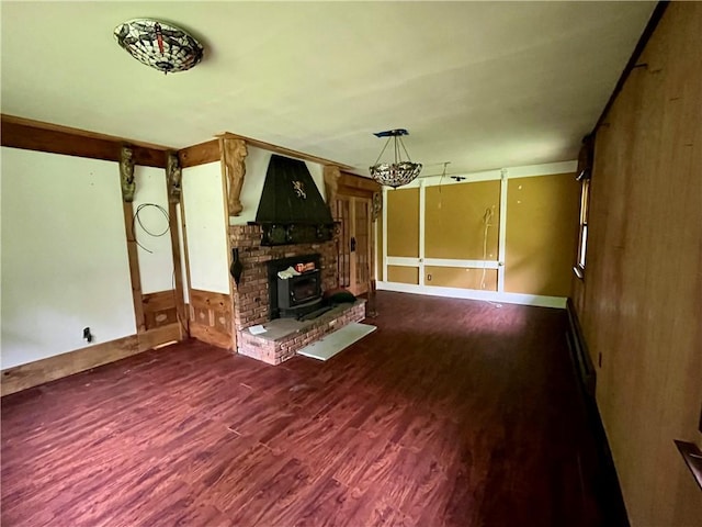 1302 Swart Rd, Middletown, NY 12455 - unfurnished living room with wood finished floors and a wood stove