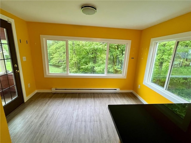 1302 Swart Rd, Middletown, NY 12455 - unfurnished sunroom featuring plenty of natural light and baseboard heating