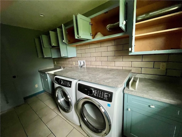 1302 Swart Rd, Middletown, NY 12455 - washroom featuring separate washer and dryer, cabinet space, tile patterned floors, and baseboards
