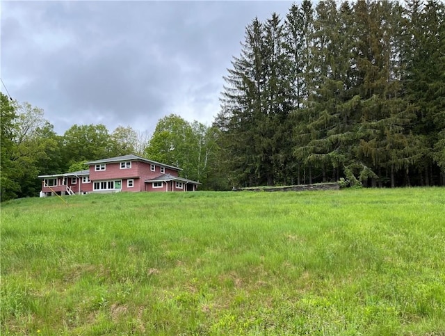 1302 Swart Rd, Middletown, NY 12455 - view of yard with a wooded view