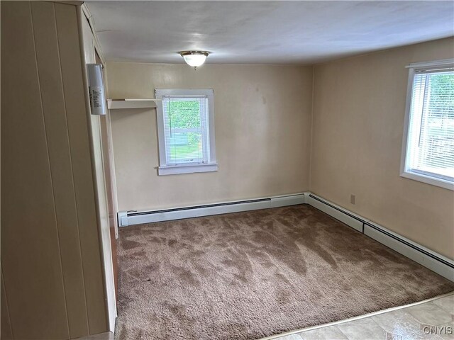 717 Lawrence St, Watertown-City, NY 13601 - carpeted empty room featuring healthy amount of natural light
