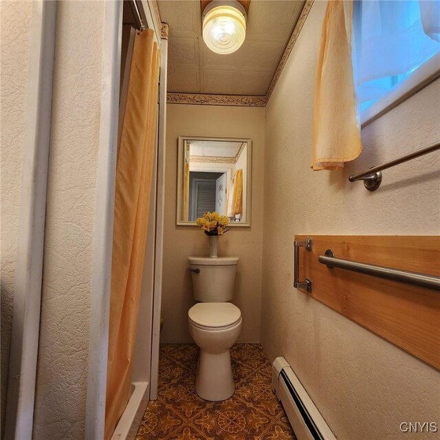717 Lawrence St, Watertown-City, NY 13601 - bathroom with toilet and a baseboard heating unit