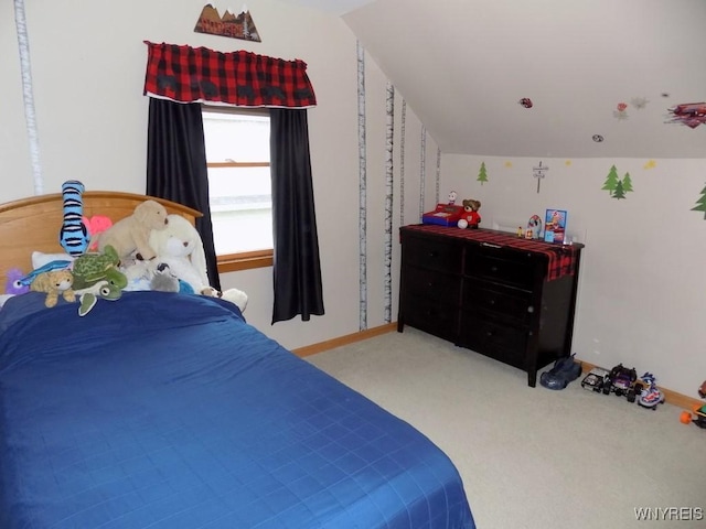 225 Fries Rd, Tonawanda-Town, NY 14150 - bedroom with carpet flooring, vaulted ceiling, and baseboards