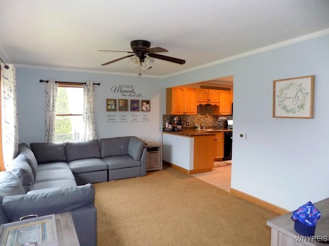 225 Fries Rd, Tonawanda-Town, NY 14150 - living room with crown molding, a ceiling fan, light colored carpet, and baseboards