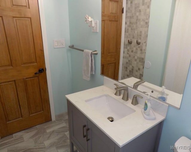 225 Fries Rd, Tonawanda-Town, NY 14150 - full bathroom featuring vanity, a shower, and toilet