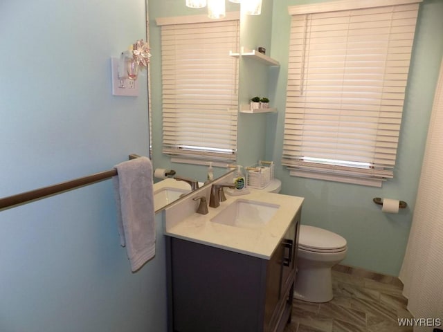 225 Fries Rd, Tonawanda-Town, NY 14150 - bathroom with vanity and toilet
