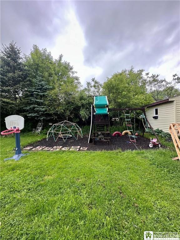 538 Erie St, Olean-City, NY 14760 - view of grassy yard with a playground
