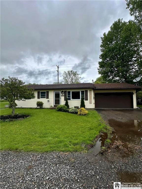 538 Erie St, Olean-City, NY 14760 - single story home with a garage, driveway, and a front yard