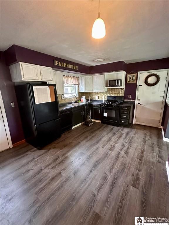 538 Erie St, Olean-City, NY 14760 - kitchen featuring black appliances, white cabinets, and dark wood-type flooring