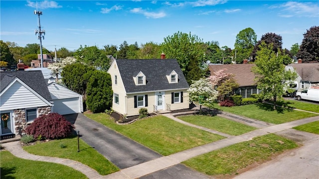 22 Idyllwood Ln, Irondequoit, NY 14617 - cape cod-style house featuring a garage, an outbuilding, and a front yard