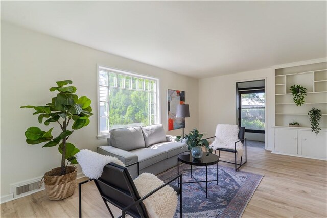 22 Idyllwood Ln, Irondequoit, NY 14617 - living area with light wood-type flooring and baseboards