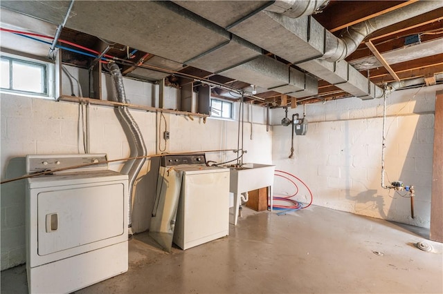 22 Idyllwood Ln, Irondequoit, NY 14617 - below grade area featuring separate washer and dryer, healthy amount of natural light, a sink, and gas meter