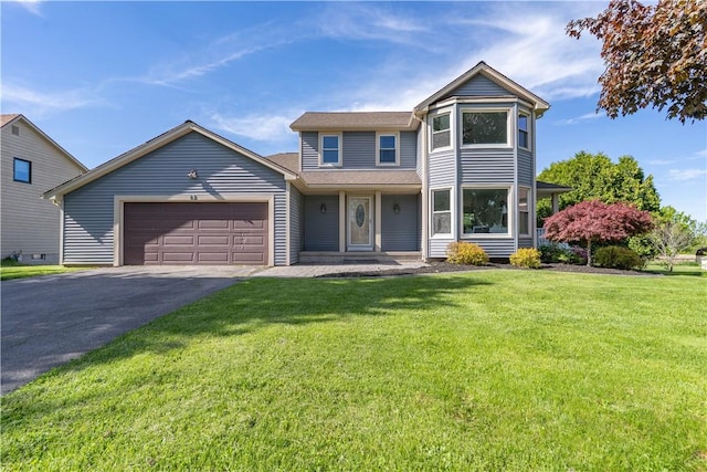 82 Haskins Ln N, Greece, NY 14468 - victorian home featuring an attached garage, driveway, and a front lawn