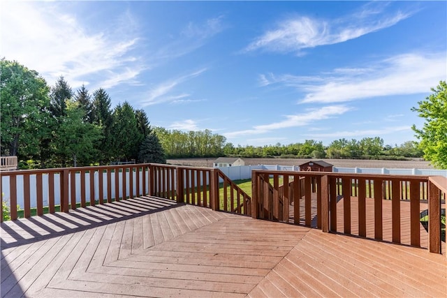 82 Haskins Ln N, Greece, NY 14468 - wooden deck featuring a fenced backyard and a shed