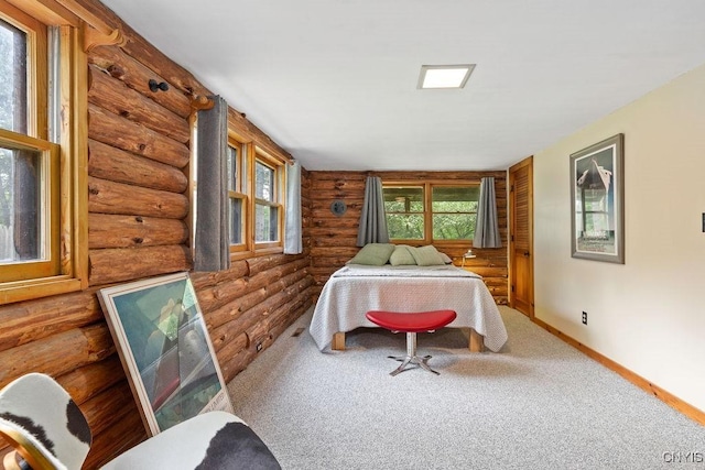 4090 Old Kennedy Rd, Onondaga, NY 13120 - bedroom with rustic walls, carpet floors, and baseboards