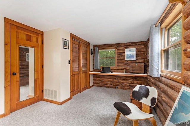 4090 Old Kennedy Rd, Onondaga, NY 13120 - office featuring rustic walls, built in desk, carpet flooring, and baseboards