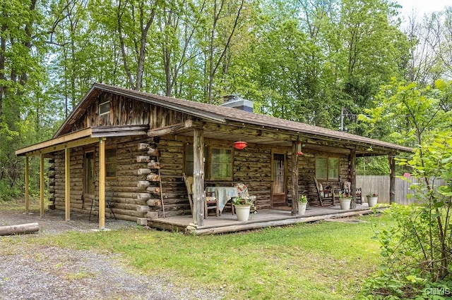 4090 Old Kennedy Rd, Onondaga, NY 13120 - exterior space featuring log exterior and a chimney