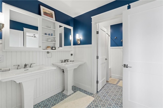 503 Grandview Ln, Milo, NY 14527 - bathroom featuring a wainscoted wall and a ceiling fan