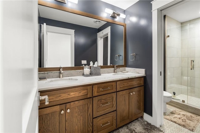 503 Grandview Ln, Milo, NY 14527 - bathroom with double vanity, a shower stall, toilet, and baseboards