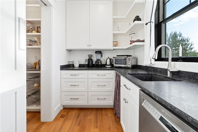 503 Grandview Ln, Milo, NY 14527 - kitchen featuring dishwasher, a sink, white cabinetry, open shelves, and light wood-style flooring