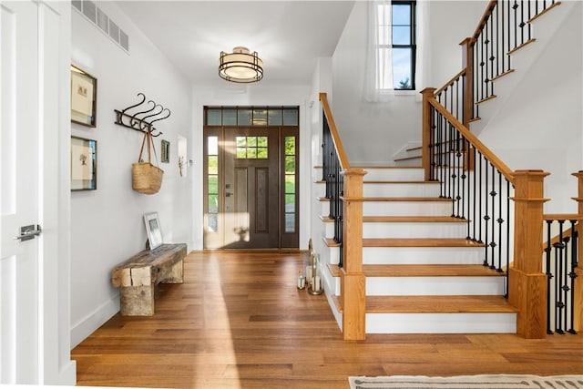 503 Grandview Ln, Milo, NY 14527 - foyer entrance featuring wood finished floors, stairs, and baseboards