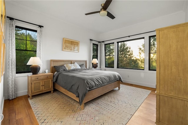 503 Grandview Ln, Milo, NY 14527 - bedroom with light wood-style flooring, ceiling fan, baseboards, and ornamental molding