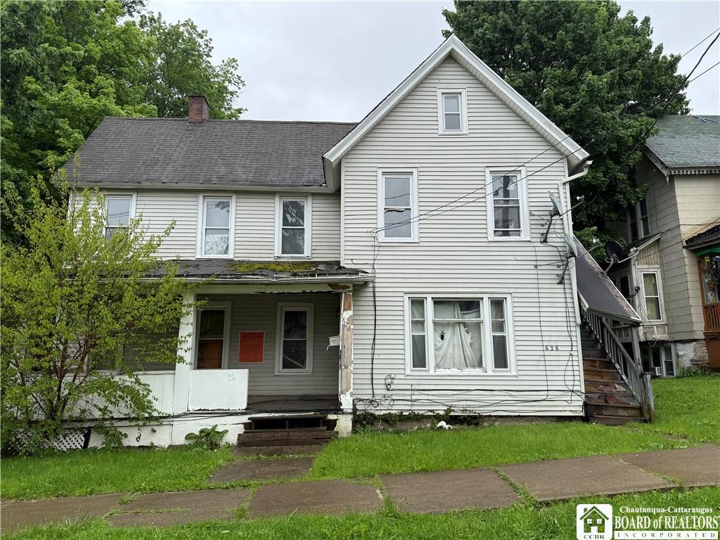 626 Spring St, Jamestown, NY 14701 - view of front facade featuring covered porch, a chimney, and stairs