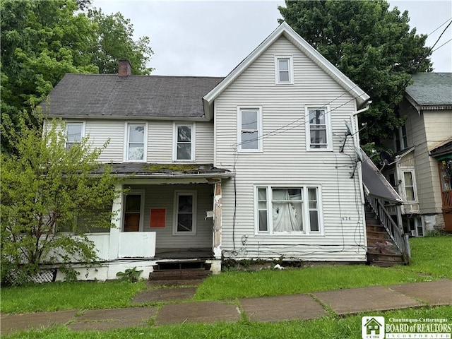 626 Spring St, Jamestown, NY 14701 - view of front facade featuring covered porch, a chimney, and stairs