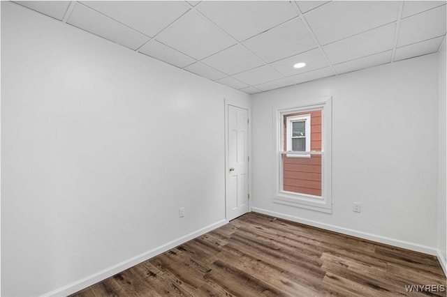 123 6th St, Niagara Falls, NY 14303 - empty room with baseboards, wood finished floors, a drop ceiling, and recessed lighting