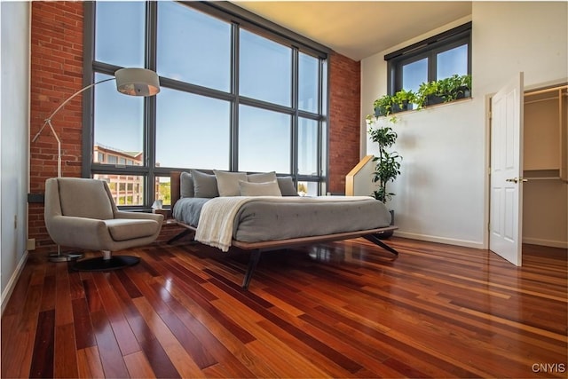 526 Plum St Unit 408, Syracuse, NY 13204 - bedroom with baseboards and hardwood / wood-style floors