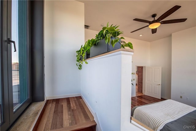 526 Plum St Unit 408, Syracuse, NY 13204 - corridor featuring wood finished floors and baseboards