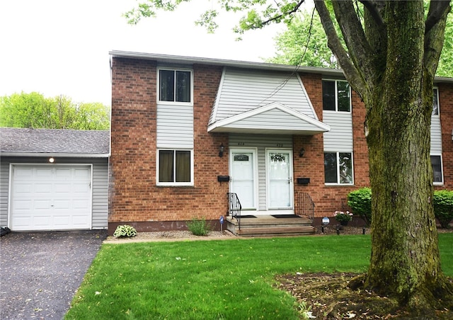 414 Fox Run, Gates, NY 14606 - view of property with an attached garage, driveway, a front yard, and brick siding
