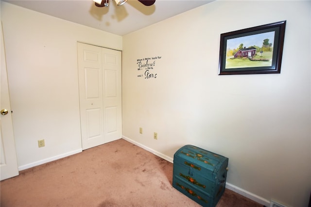 414 Fox Run, Gates, NY 14606 - unfurnished bedroom featuring carpet flooring, a closet, baseboards, and a ceiling fan