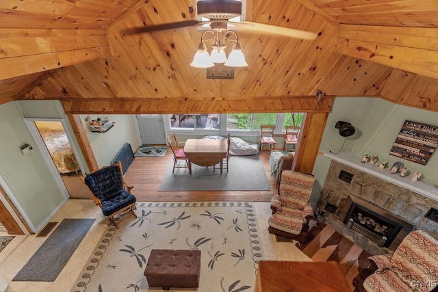 633 Eno Rd, Elbridge, NY 13080 - living area featuring vaulted ceiling, wooden ceiling, and a fireplace