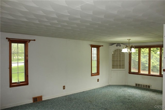 7 Catlin Ave, Paris, NY 13456 - spare room with a chandelier, plenty of natural light, and carpet flooring