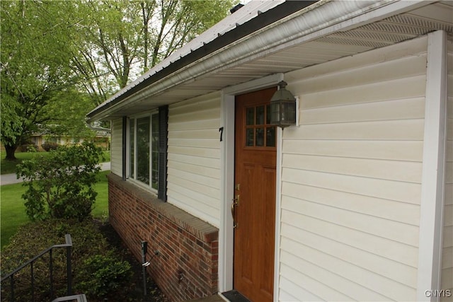 7 Catlin Ave, Paris, NY 13456 - view of exterior entry featuring brick siding