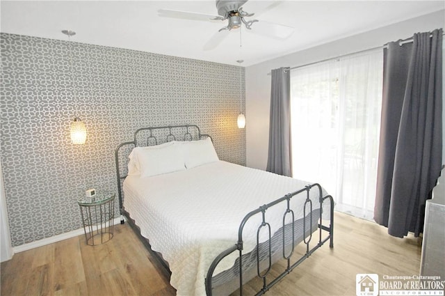 178 W Main St, Westfield, NY 14787 - bedroom with light wood-style flooring, a ceiling fan, and baseboards